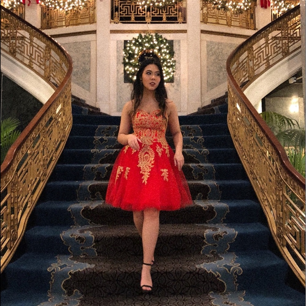 Red and gold appliqué knee length prom dress
